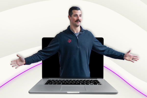 Coach Max popping out of a laptop screen