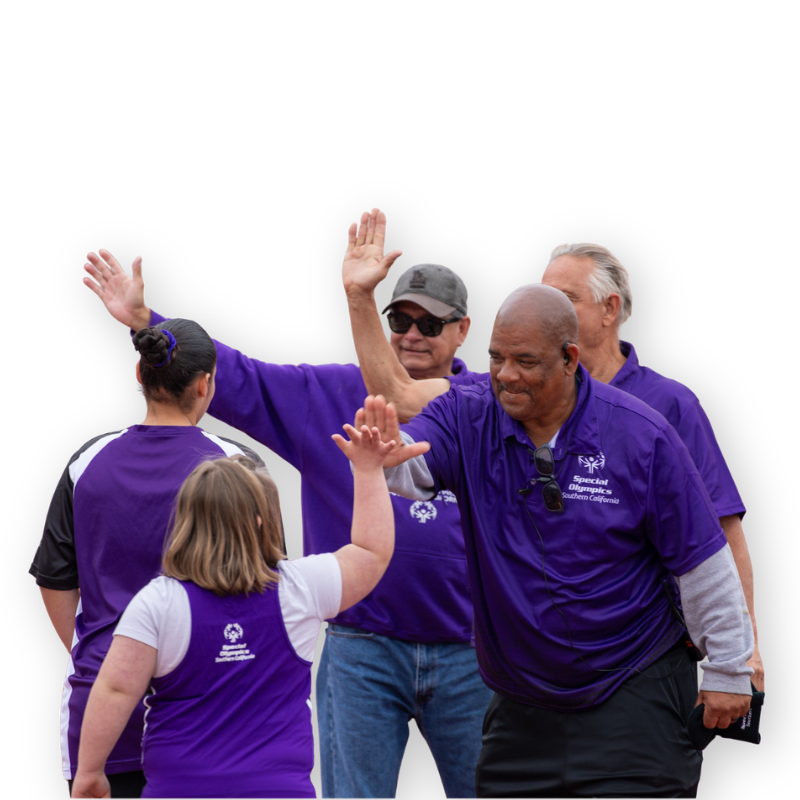 Coaches high fiving athletes