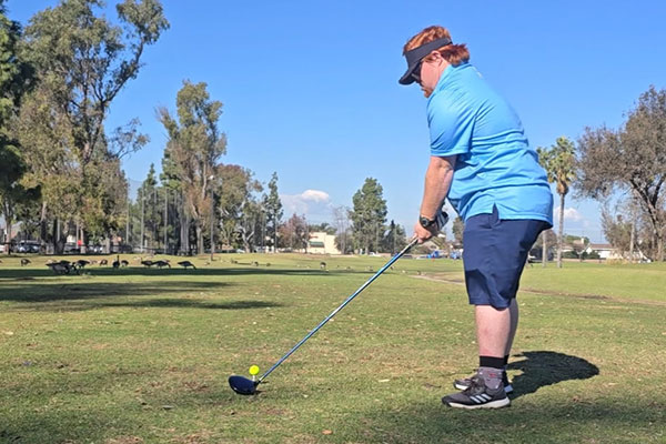 Nathan Erksine golfing